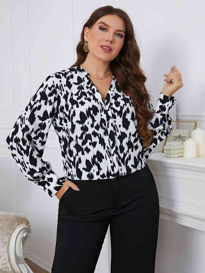 Melo Apparel Blouse imprimée à manches longues et col en V grande taille