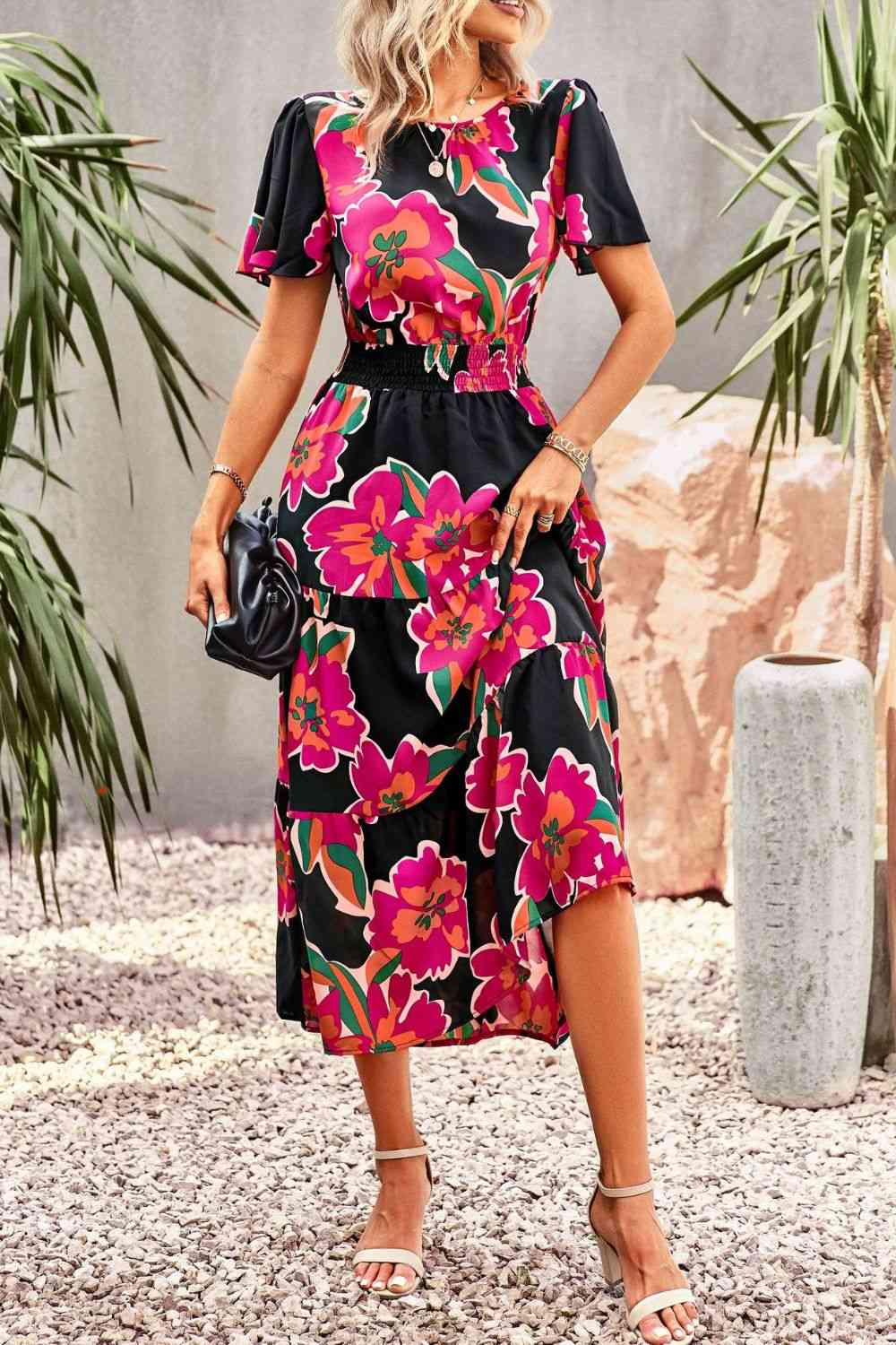 Vestido midi escalonado con mangas abullonadas y estampado floral