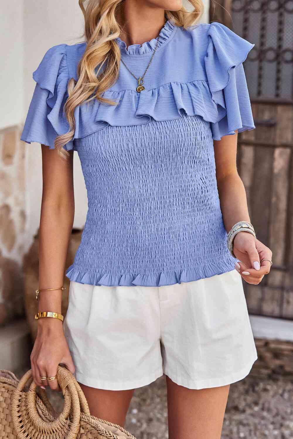 Blouse smockée à manches flottantes et nouée au dos